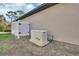 Generac generator with protective fence for backup power at 376 Hampton Hills Ct, Debary, FL 32713