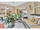 Bright sunroom with access to the backyard and a view of the living area at 376 Hampton Hills Ct, Debary, FL 32713