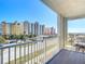 Balcony with table and chairs, offering an ocean view at 3800 S Atlantic Ave # 4080, Daytona Beach, FL 32118