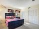 Spacious bedroom with a queen bed and ample closet space at 3800 S Atlantic Ave # 4080, Daytona Beach, FL 32118