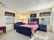 Bedroom with a queen bed and double closets at 3800 S Atlantic Ave # 4080, Daytona Beach, FL 32118
