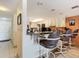 Kitchen with breakfast bar, stainless steel appliances, and white cabinets at 3800 S Atlantic Ave # 4080, Daytona Beach, FL 32118