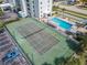 Shared tennis and pickleball court with pool view at 3800 S Atlantic Ave # 4080, Daytona Beach, FL 32118