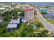 An aerial view showcasing the condo, pool, and parking at 404 S Beach St # 240 701, Daytona Beach, FL 32114