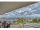 Balcony with seating, overlooking marina and city skyline at 404 S Beach St # 240 701, Daytona Beach, FL 32114