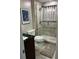 Updated bathroom with walk-in shower and granite vanity at 404 S Beach St # 240 701, Daytona Beach, FL 32114