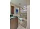 Bathroom features a walk-in shower and modern vanity at 404 S Beach St # 240 701, Daytona Beach, FL 32114