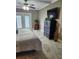 Bedroom with tiled floors and access to balcony at 404 S Beach St # 240 701, Daytona Beach, FL 32114