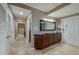 Bright entryway with built-in storage and elegant mirror at 404 S Beach St # 240 701, Daytona Beach, FL 32114