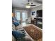 Living room features a fireplace and access to a balcony at 404 S Beach St # 240 701, Daytona Beach, FL 32114