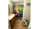 Bathroom with shower, toilet, and vanity with wood cabinets at 444 S Deerwood Ave, Orlando, FL 32825