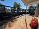 Outdoor patio with pavers, wood lattice, and bench at 444 S Deerwood Ave, Orlando, FL 32825