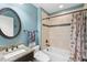 Bathroom with tub, shower, and updated vanity at 524 Quail Hill Dr, Debary, FL 32713