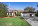 House exterior, stone accents, and American flag at 524 Quail Hill Dr, Debary, FL 32713