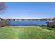 Serene lakefront property with lush green grass at 524 Quail Hill Dr, Debary, FL 32713
