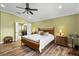Large main bedroom with ensuite bathroom access at 524 Quail Hill Dr, Debary, FL 32713