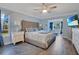 Relaxing main bedroom with lake view and neutral color palette at 529 Tabatha Dr, Osteen, FL 32764