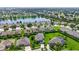 Community overview showcasing the subject property near a lake at 5423 Swordfern Ct, Port Orange, FL 32128