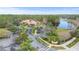 Community clubhouse with ample parking and beautiful landscaping at 5423 Swordfern Ct, Port Orange, FL 32128