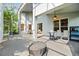 Relaxing screened patio with ceiling fan and outdoor furniture at 5423 Swordfern Ct, Port Orange, FL 32128
