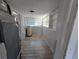 Laundry area with vinyl flooring and shelving at 610 Division St, Daytona Beach, FL 32114