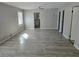 Spacious living room with gray walls and wood-look flooring at 610 Division St, Daytona Beach, FL 32114