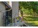 Private balcony with hanging plants and a hammock at 963 Helmsley Ct # 207, Lake Mary, FL 32746