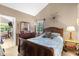 Main bedroom with vaulted ceiling and dresser at 963 Helmsley Ct # 207, Lake Mary, FL 32746