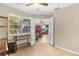 Open living room with french doors leading to the backyard at 963 Helmsley Ct # 207, Lake Mary, FL 32746