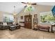 Bright living room featuring vaulted ceiling and large windows at 963 Helmsley Ct # 207, Lake Mary, FL 32746