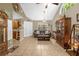 Spacious living room with vaulted ceiling and tile flooring at 963 Helmsley Ct # 207, Lake Mary, FL 32746