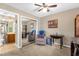 Cozy office space with a comfortable chair and mirrored closet at 963 Helmsley Ct # 207, Lake Mary, FL 32746