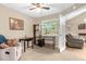 Bright office space with a comfortable chair and large window at 963 Helmsley Ct # 207, Lake Mary, FL 32746