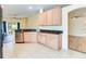 Modern kitchen with granite countertops and stainless steel appliances at 981 Wilmington Dr, Deltona, FL 32725