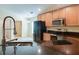 Kitchen features stainless steel appliances and granite countertops at 981 Wilmington Dr, Deltona, FL 32725