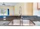 Modern double sink with a sleek gooseneck faucet at 981 Wilmington Dr, Deltona, FL 32725