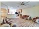 Open living area with hardwood floors and ceiling fan at 981 Wilmington Dr, Deltona, FL 32725