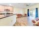 Bright living room with hardwood floors and access to backyard at 981 Wilmington Dr, Deltona, FL 32725