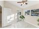Well-lit bedroom, marble floors and sliding mirrored closet at 118 N Sunland Dr, Sanford, FL 32773