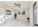 Bedroom with marble floors and two windows at 118 N Sunland Dr, Sanford, FL 32773