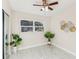 Bright bedroom with mirrored closet and marble floor at 118 N Sunland Dr, Sanford, FL 32773