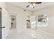 Bedroom with marble floors and ensuite bathroom at 118 N Sunland Dr, Sanford, FL 32773