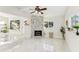 Modern stone fireplace with a built-in shelving unit at 118 N Sunland Dr, Sanford, FL 32773