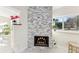 Modern stone fireplace in a bright living area at 118 N Sunland Dr, Sanford, FL 32773
