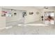 Spacious living area with marble floors and sunlit views at 118 N Sunland Dr, Sanford, FL 32773