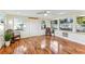 Sunroom features hardwood floors and plenty of natural light at 118 N Sunland Dr, Sanford, FL 32773