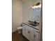 Clean bathroom with single vanity, granite countertop, and modern fixtures at 1205 2Nd St, Orange City, FL 32763