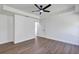 Bright bedroom with sleek flooring and modern ceiling fan at 1205 2Nd St, Orange City, FL 32763