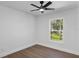 Cozy bedroom with modern flooring, fan and window at 1205 2Nd St, Orange City, FL 32763