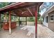 Large backyard with covered patio and additional seating at 139 Floridana Rd, Debary, FL 32713